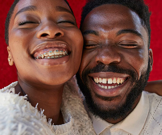 Two people smiling